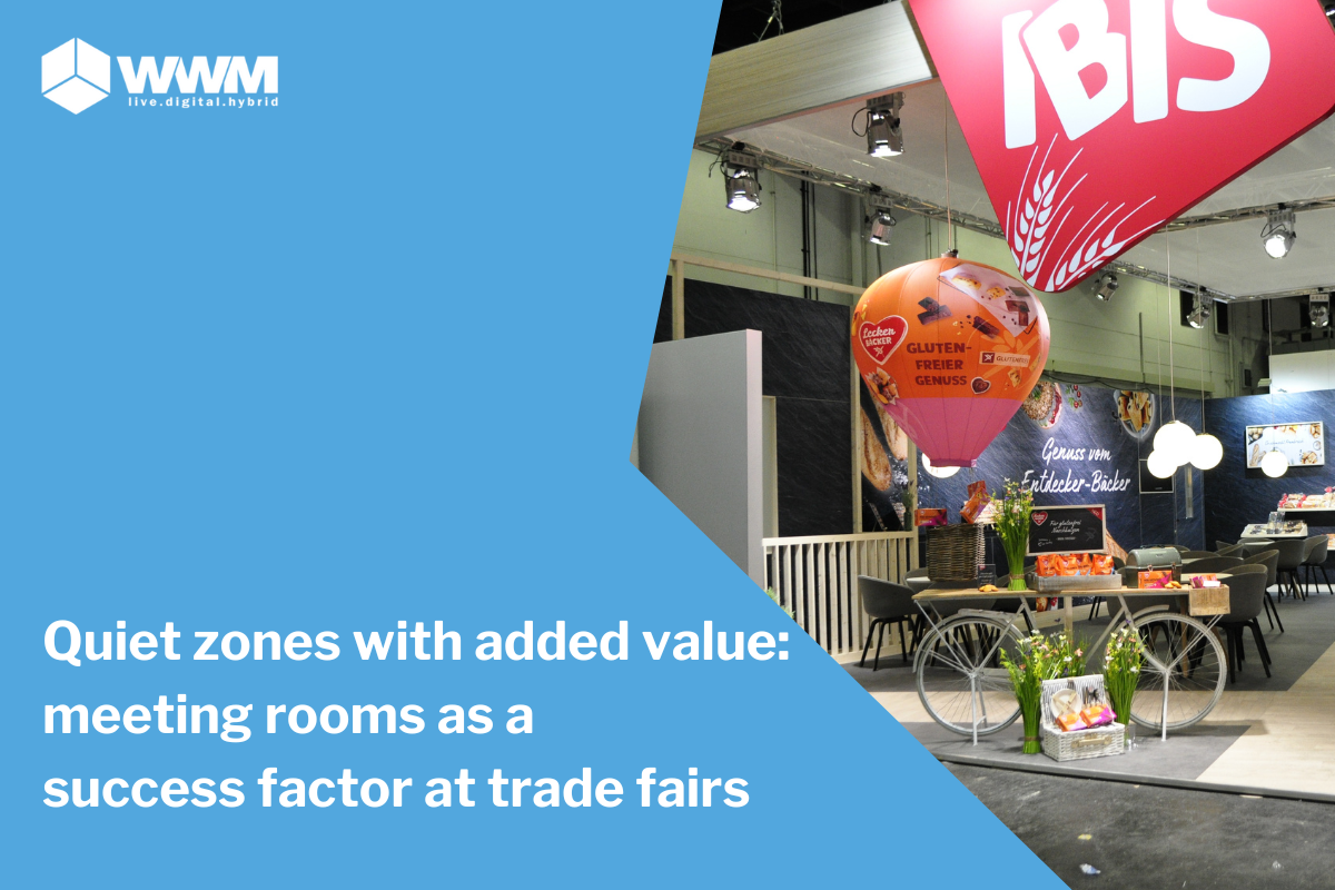 Rest zones at trade fairs - IBIS exhibition stand with meeting area, bicycle, and decorative hot air balloon.