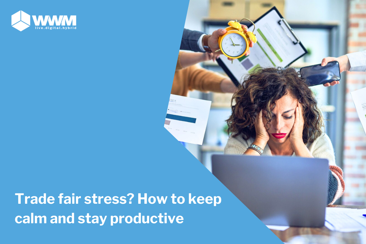 Trade fair stress - woman holds her head in stress 